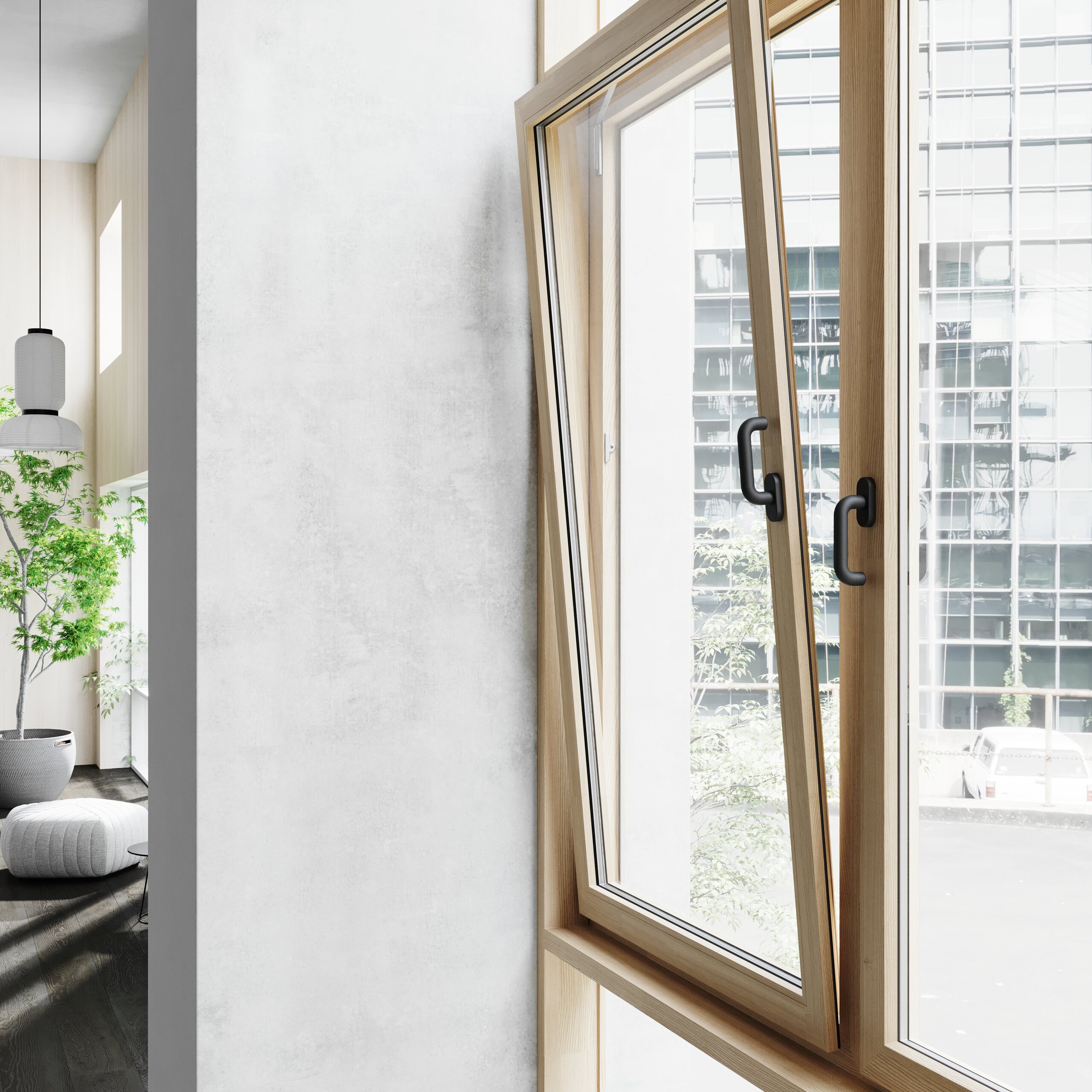 A tilted wooden window with black synthetic material window handles against a grey concrete wall