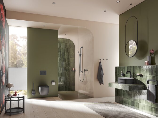 Bathroom with green and grey accents in the WC and shower areas, as well as around the washbasin