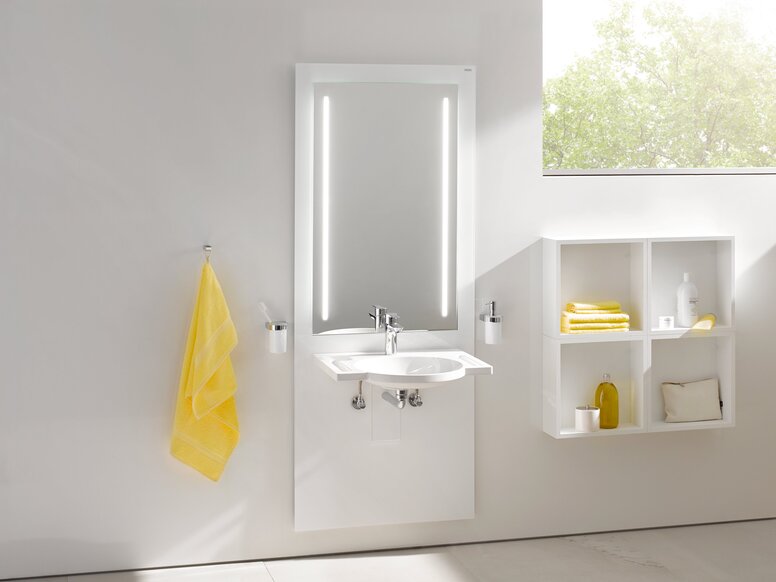 Wall-mounted washbasin unit with integrated mirror, featuring two vertical lights and a tap, against a white wall
